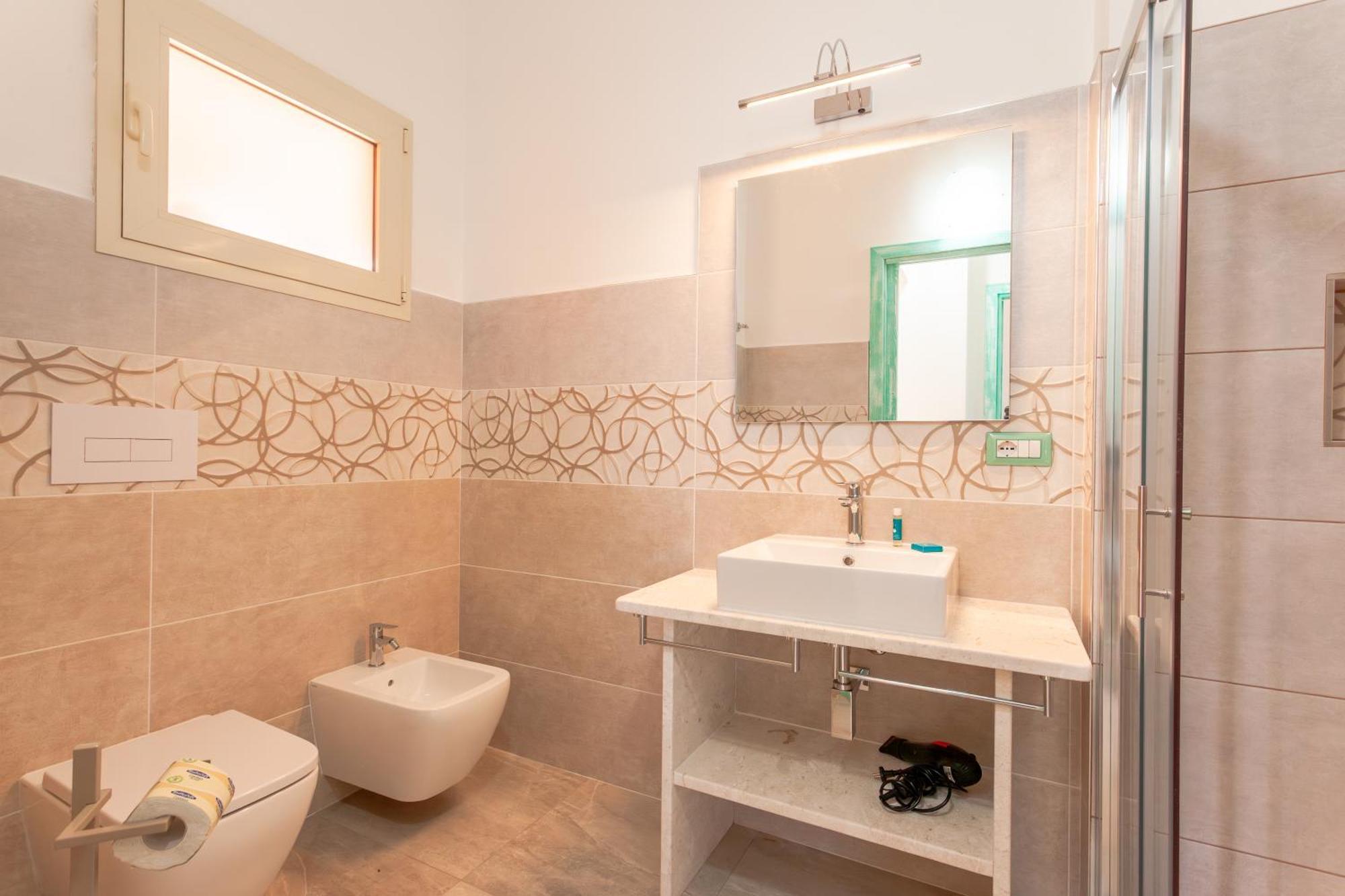 Residence Le Colonnine Сан-Теодоро Екстер'єр фото